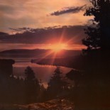 Vintage Lake Tahoe Postcard showing the sunrise over Emerald Bay