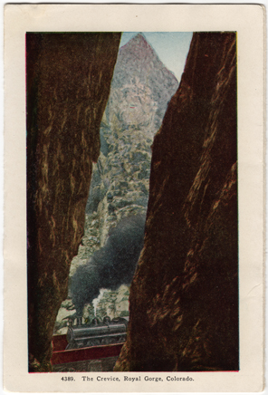 Fissure in Royal Gorge Canyon known as The Crevice with an old Train