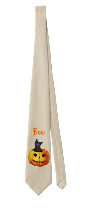 Product photograph of off white neck tie featuring a black cat sitting in a pumpkin saying "Boo"!